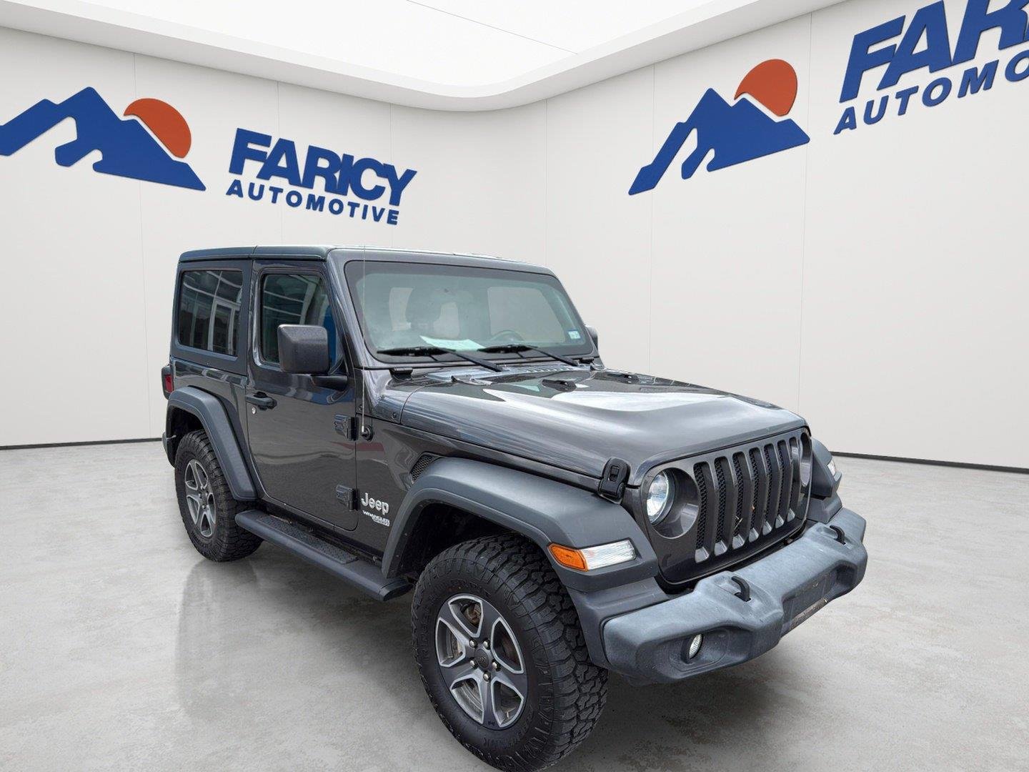 Used 2019 Granite Crystal Clearcoat Metallic Jeep Sport S image 2