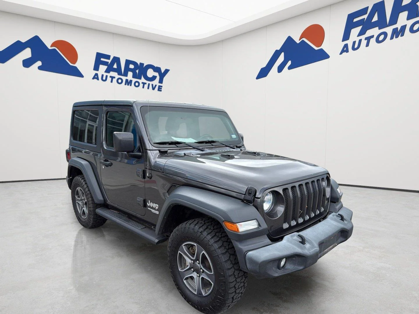 Used 2019 Granite Crystal Metallic Clearcoat Jeep Sport S image 2