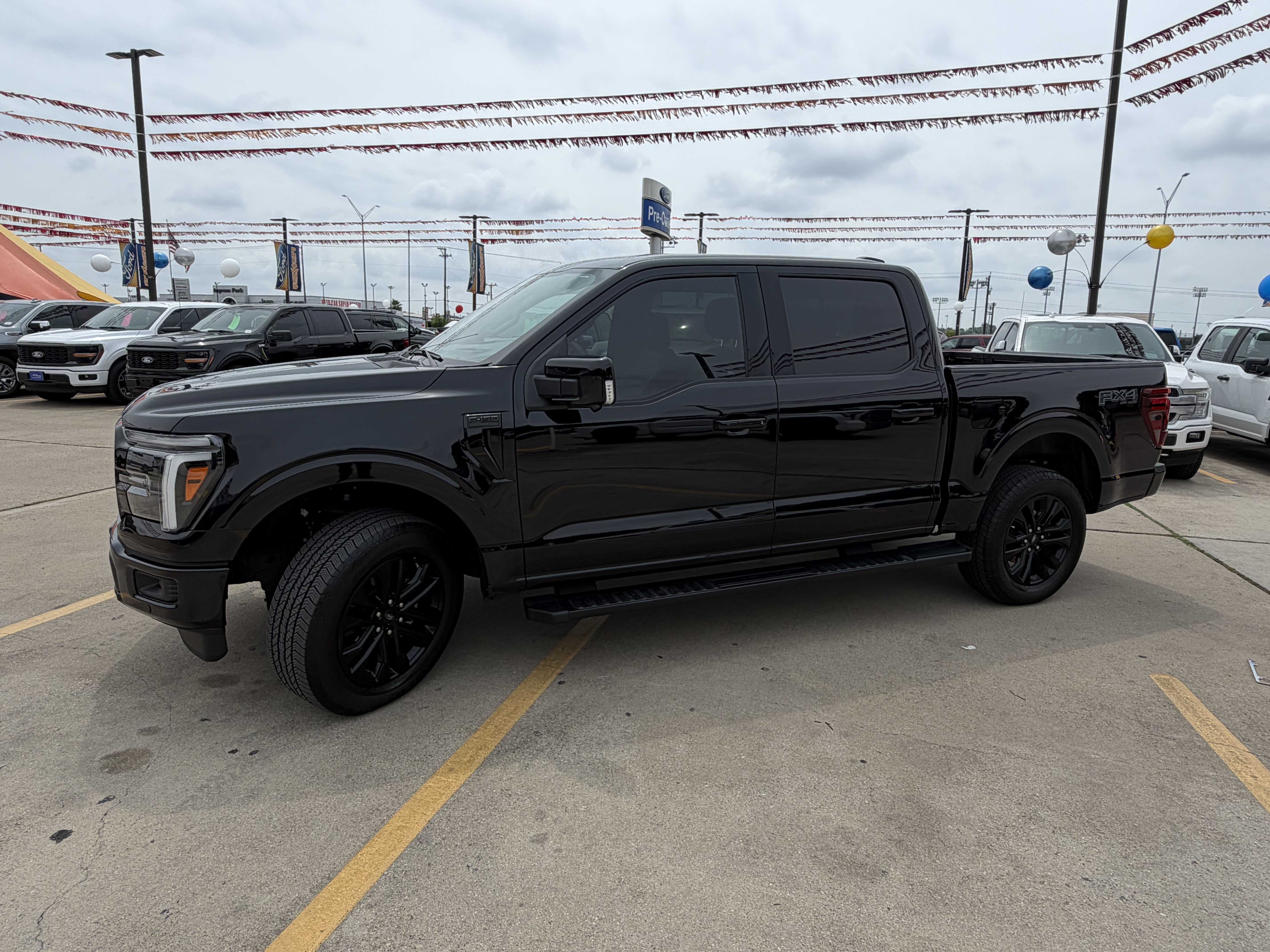 Used 2025 Agate Black Metallic Ford Lariat image 11
