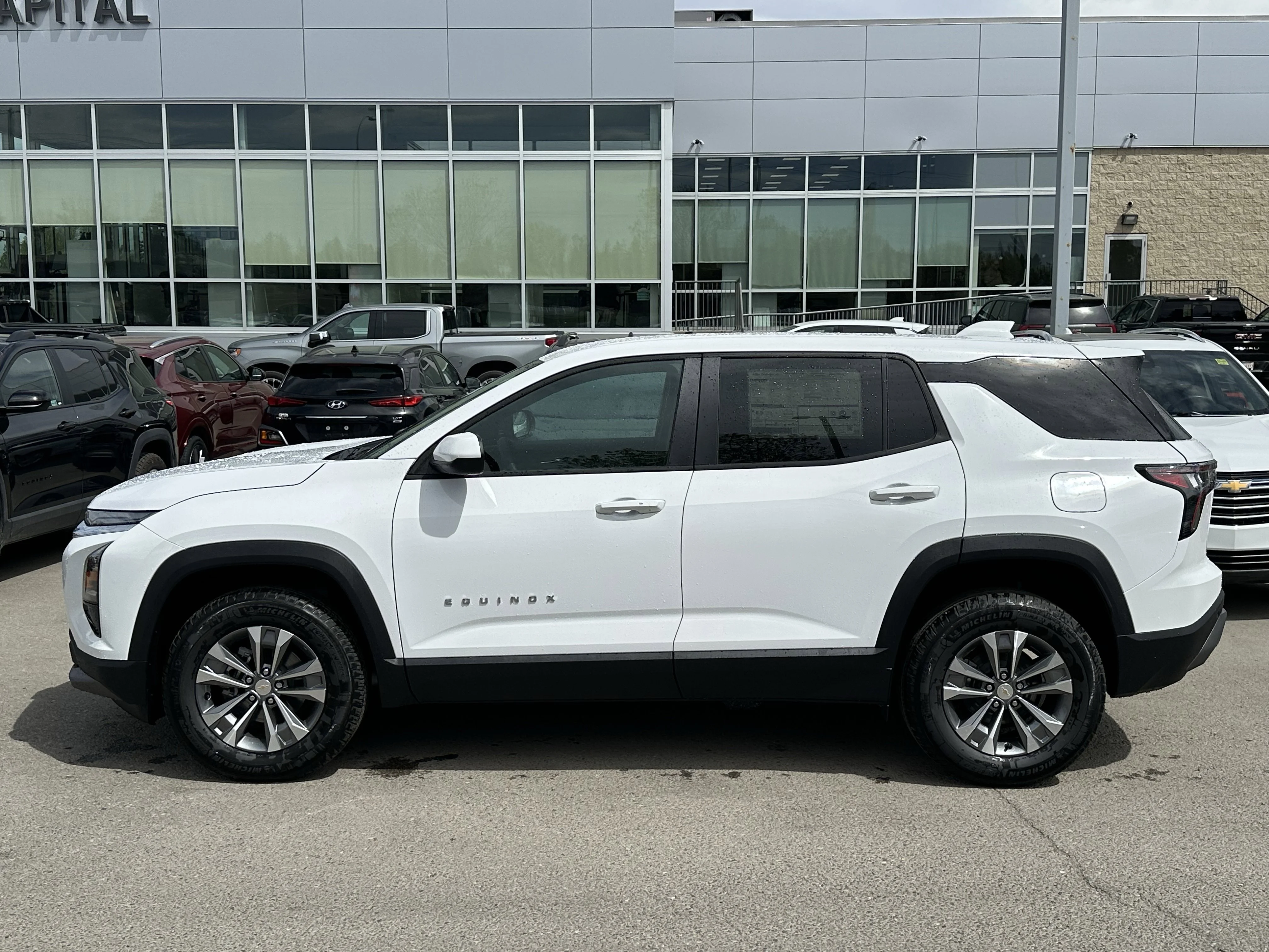 New 2026 Summit White Chevrolet AWD LT image 3
