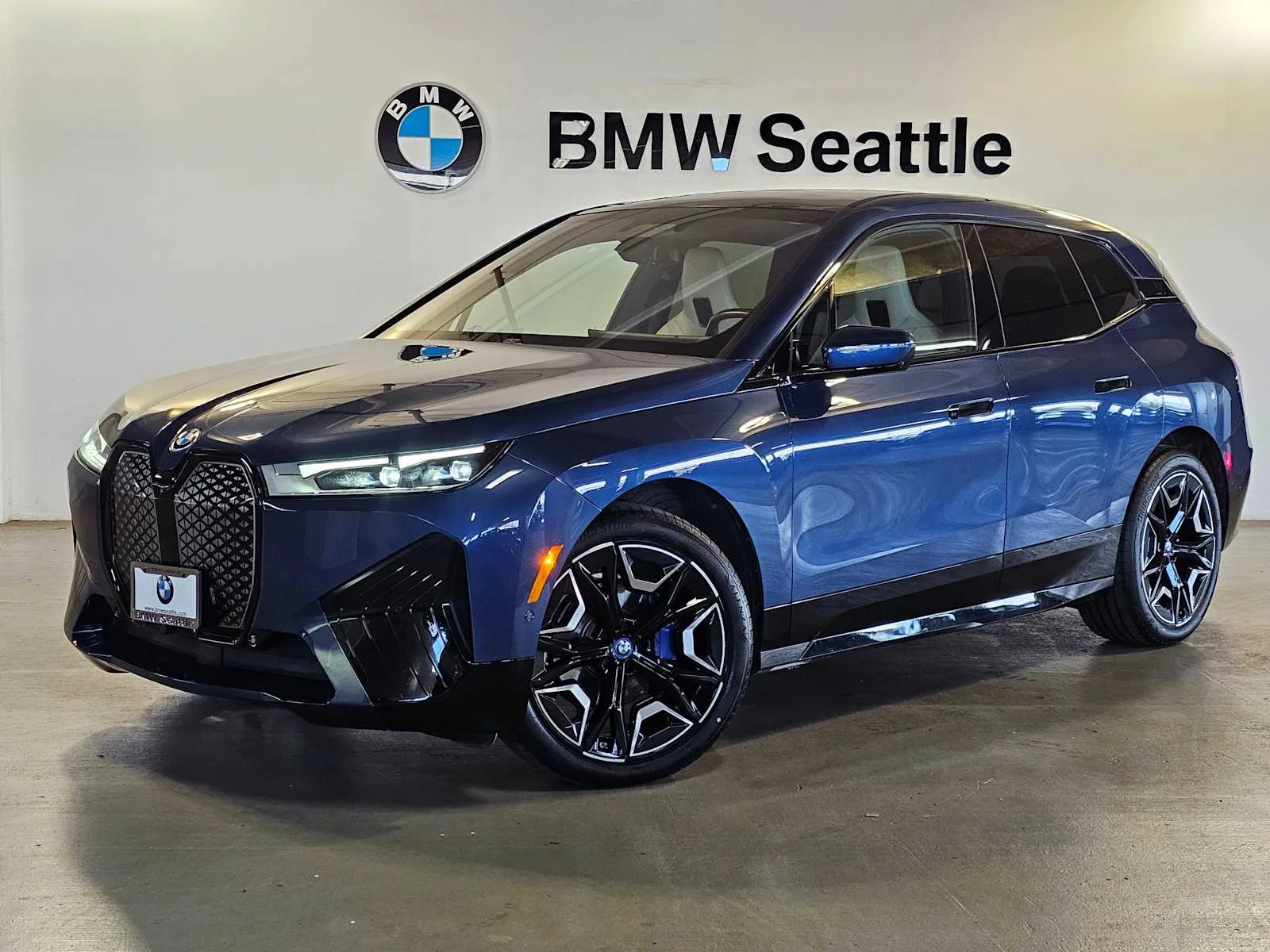 Certified Used 2024 Phytonic Blue Metallic BMW xDrive50 image 1