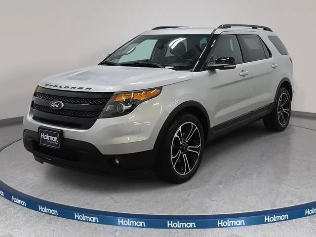 Used 2015 Ingot Silver Ford Sport image 1