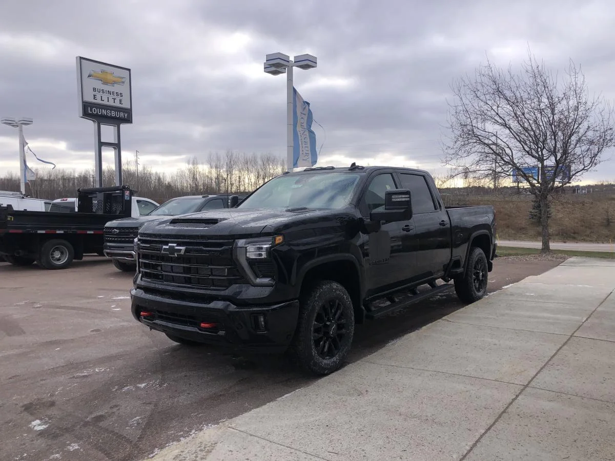 Used 2026 Black Chevrolet 4WD Crew Cab 159" LTZ image 4