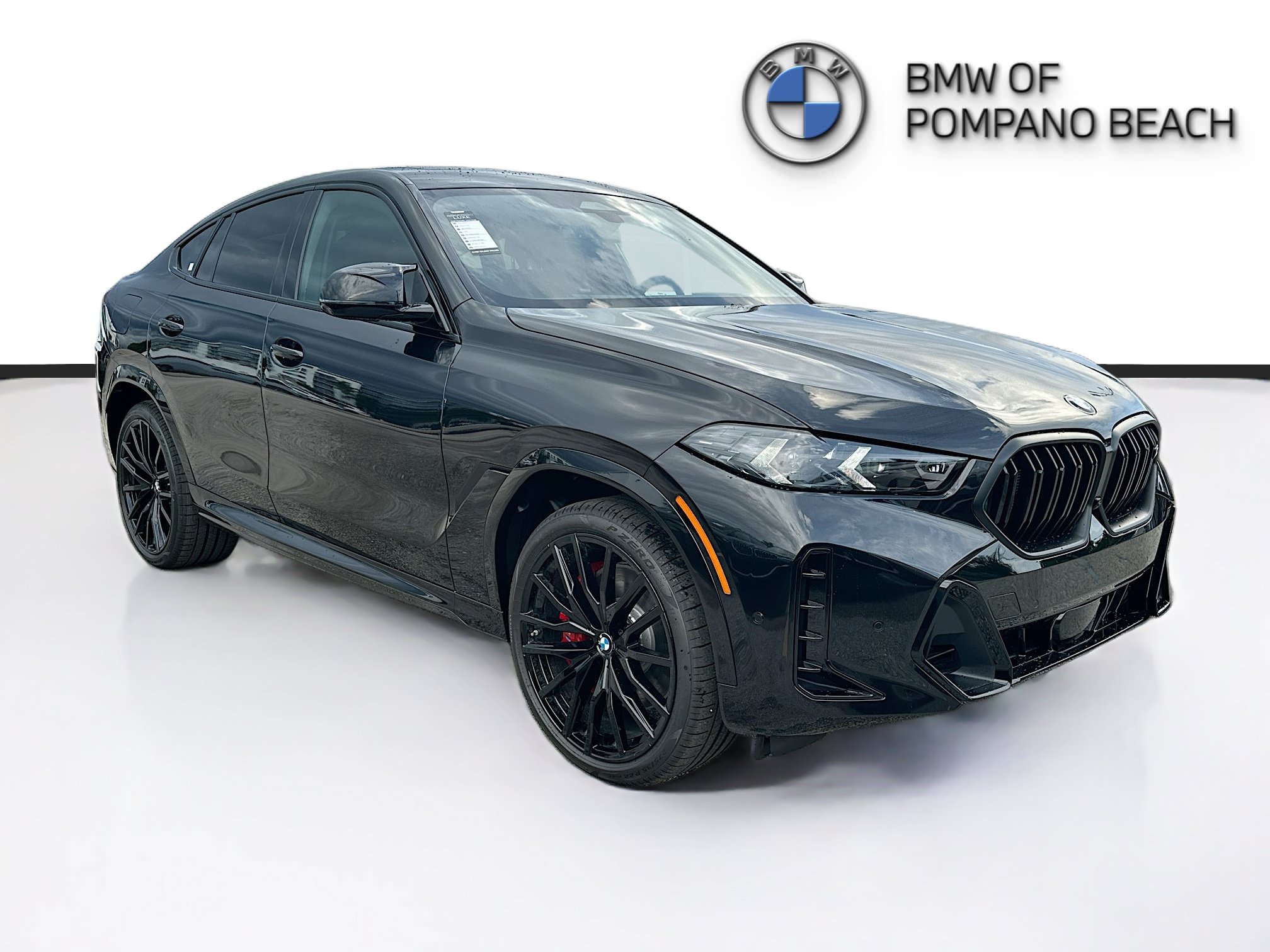 New 2027 Black Sapphire Metallic BMW M60i image 1