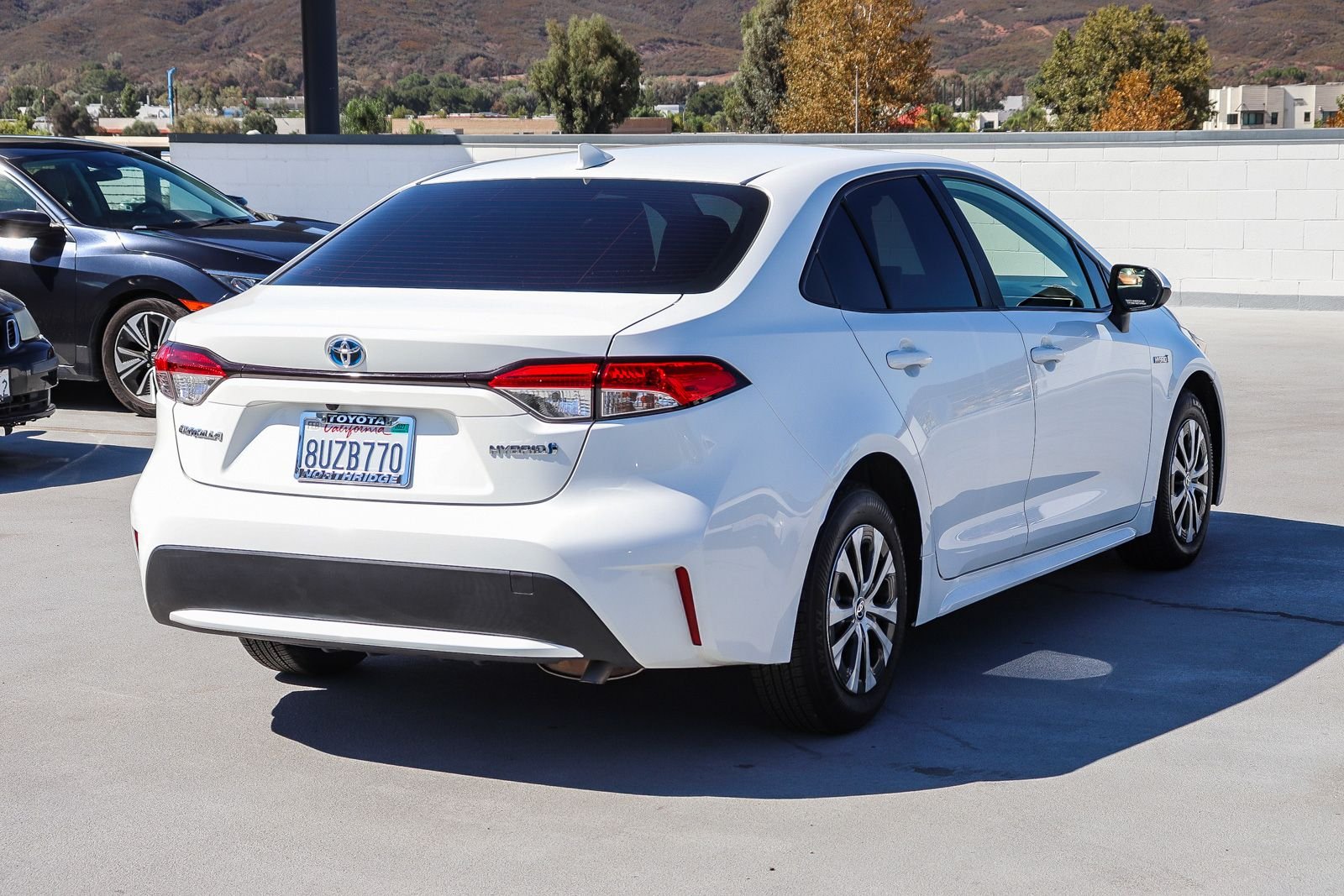 Used 2021 White Toyota LE image 7