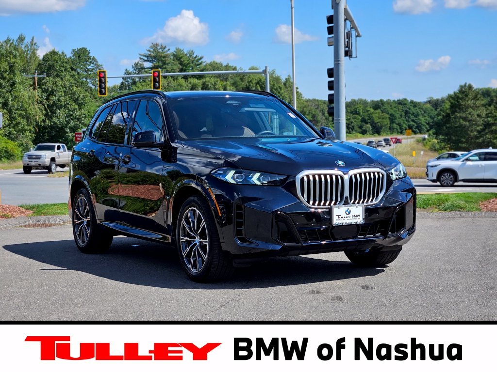 Used 2026 Carbon Black Metallic BMW xDrive40i image 1