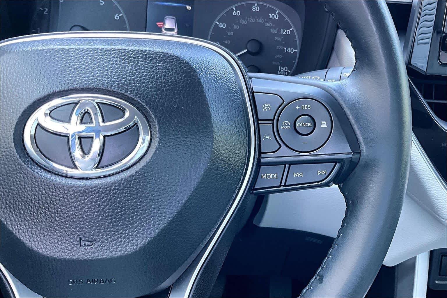 Used 2025 Blue Crush Metallic Toyota LE image 25