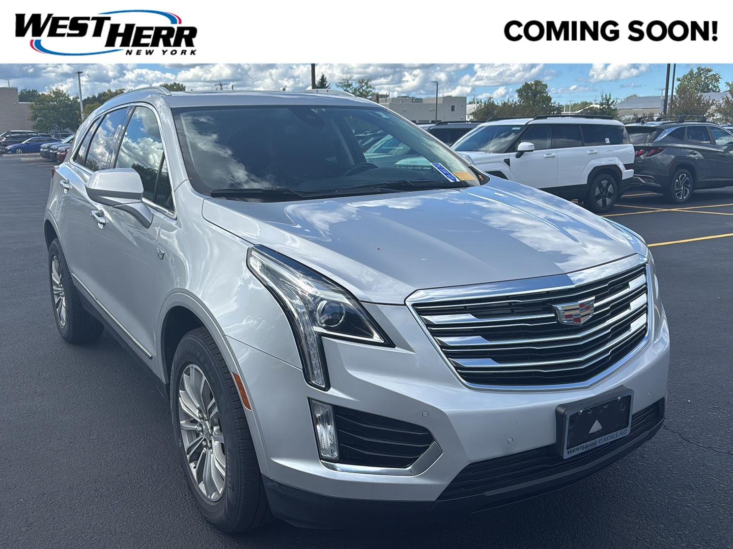 Used 2019 Radiant Silver Metallic Cadillac Luxury AWD image 1
