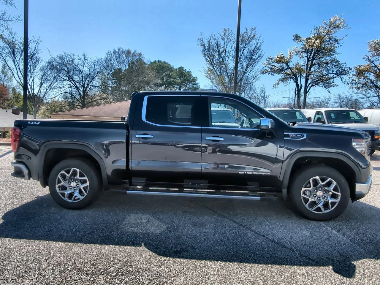 New 2026 TITANIUM RUSH METALLIC GMC SLT image 9