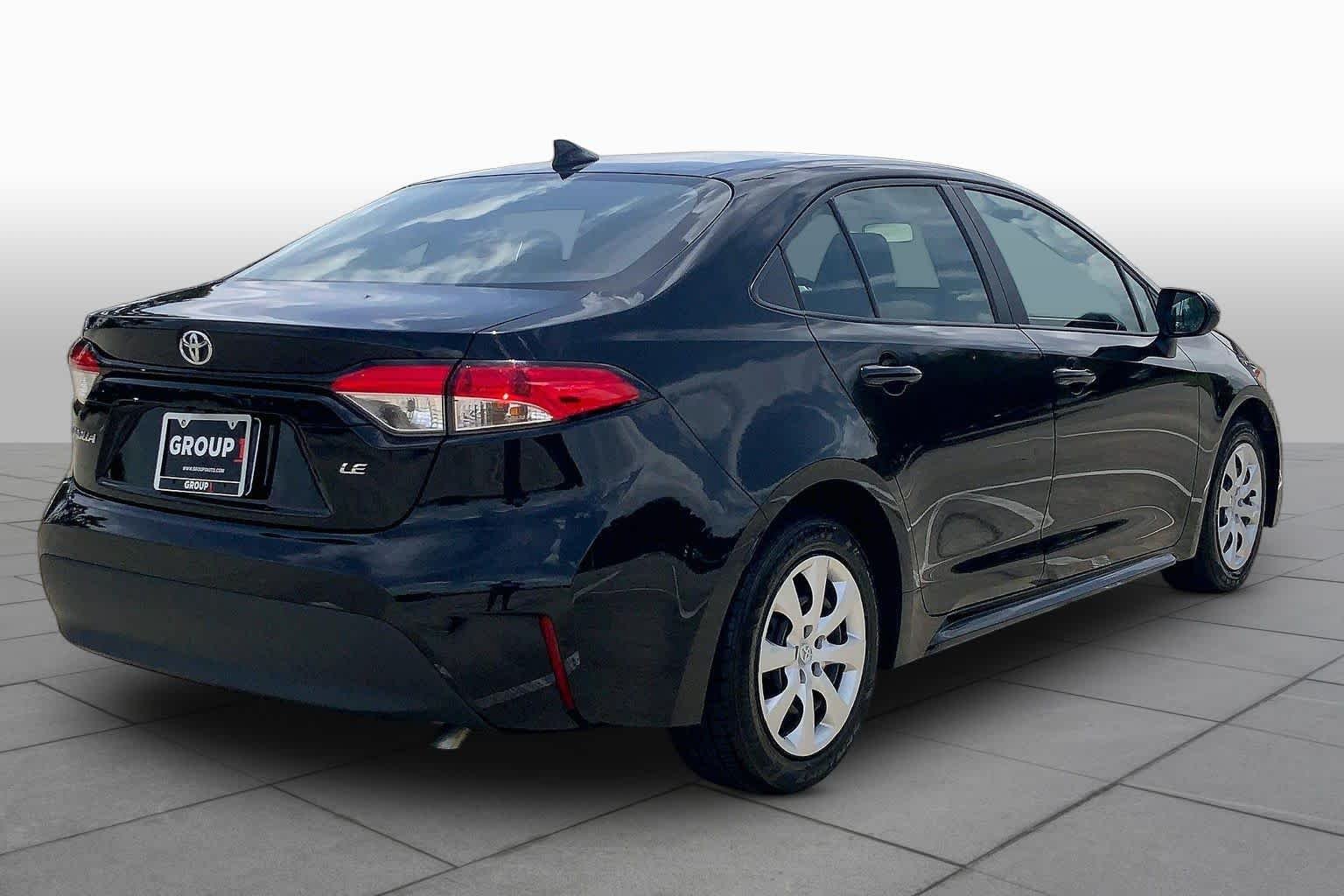 Used 2024 Midnight Black Metallic Toyota LE image 13