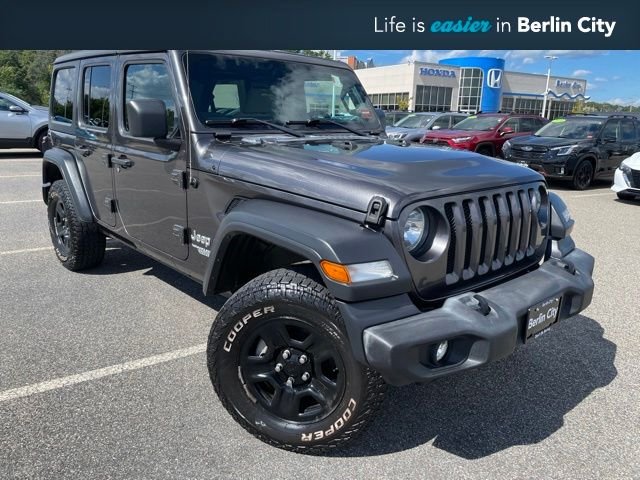 Used 2018 Crystal Metallic Jeep Unlimited Sport S image 1