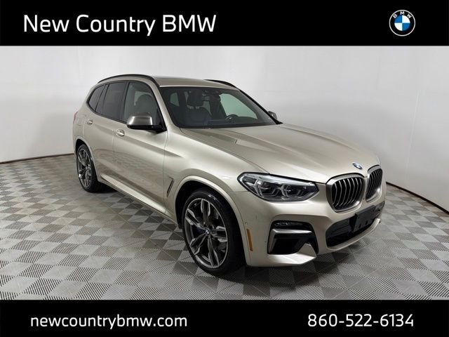 Used 2021 Sunstone metallic BMW M40i image 1
