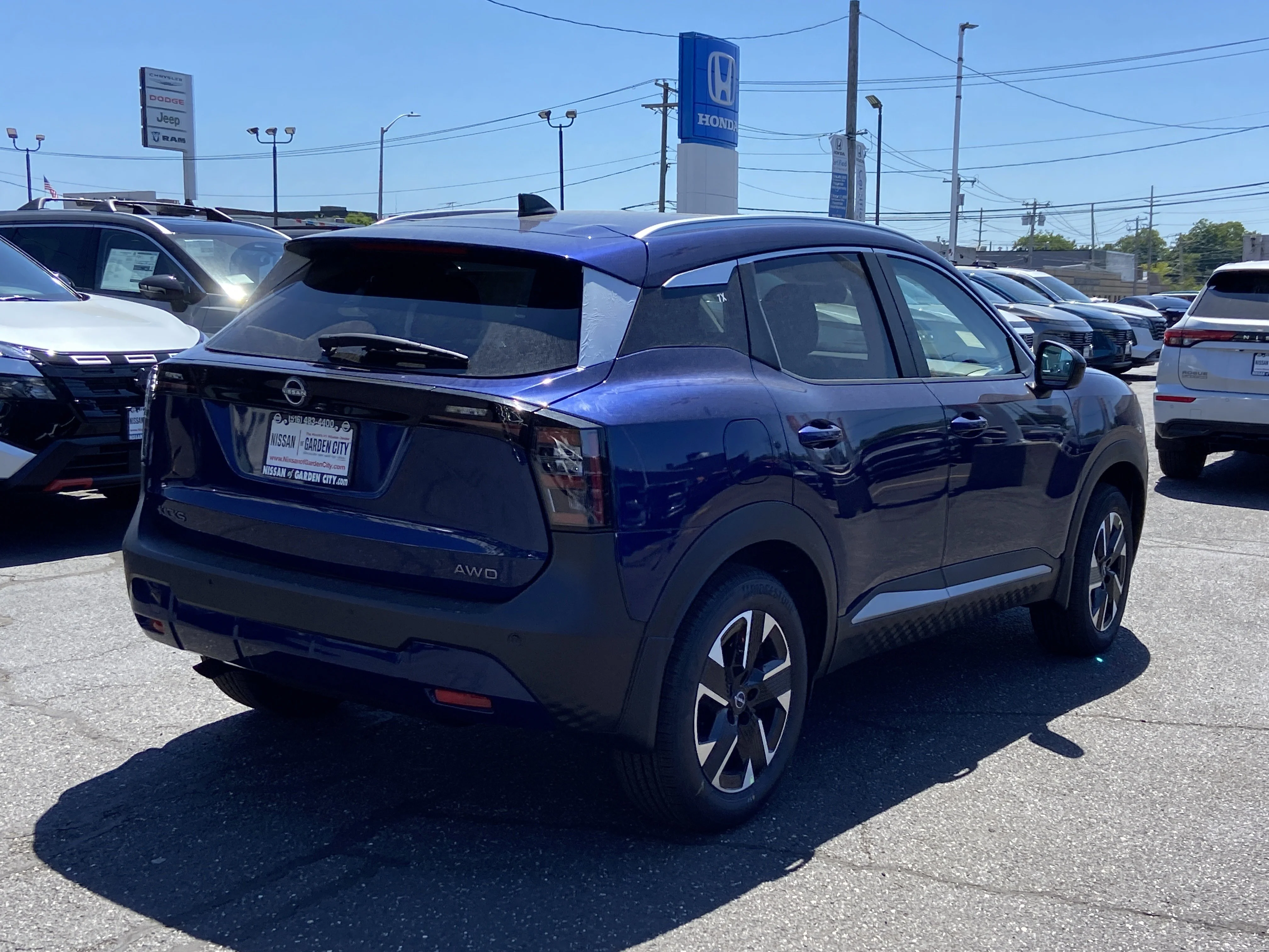 New 2026 Deep Blue Pearl Nissan SV image 4
