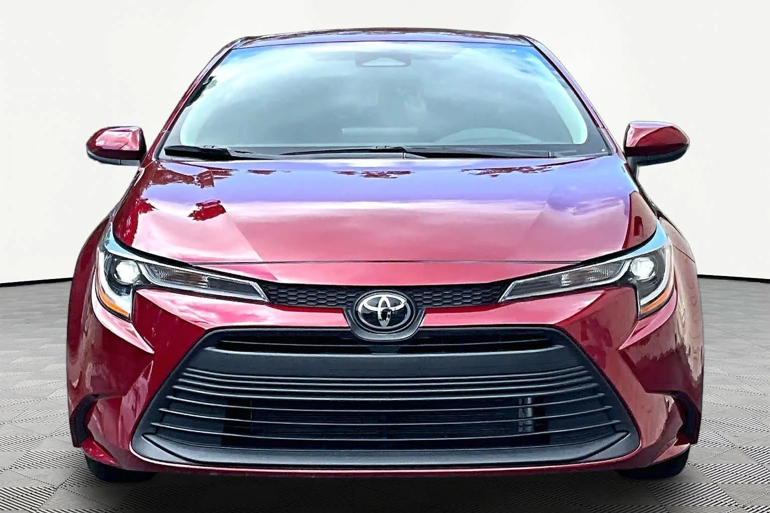 Used 2024 Ruby Flare Pearl Toyota LE image 4
