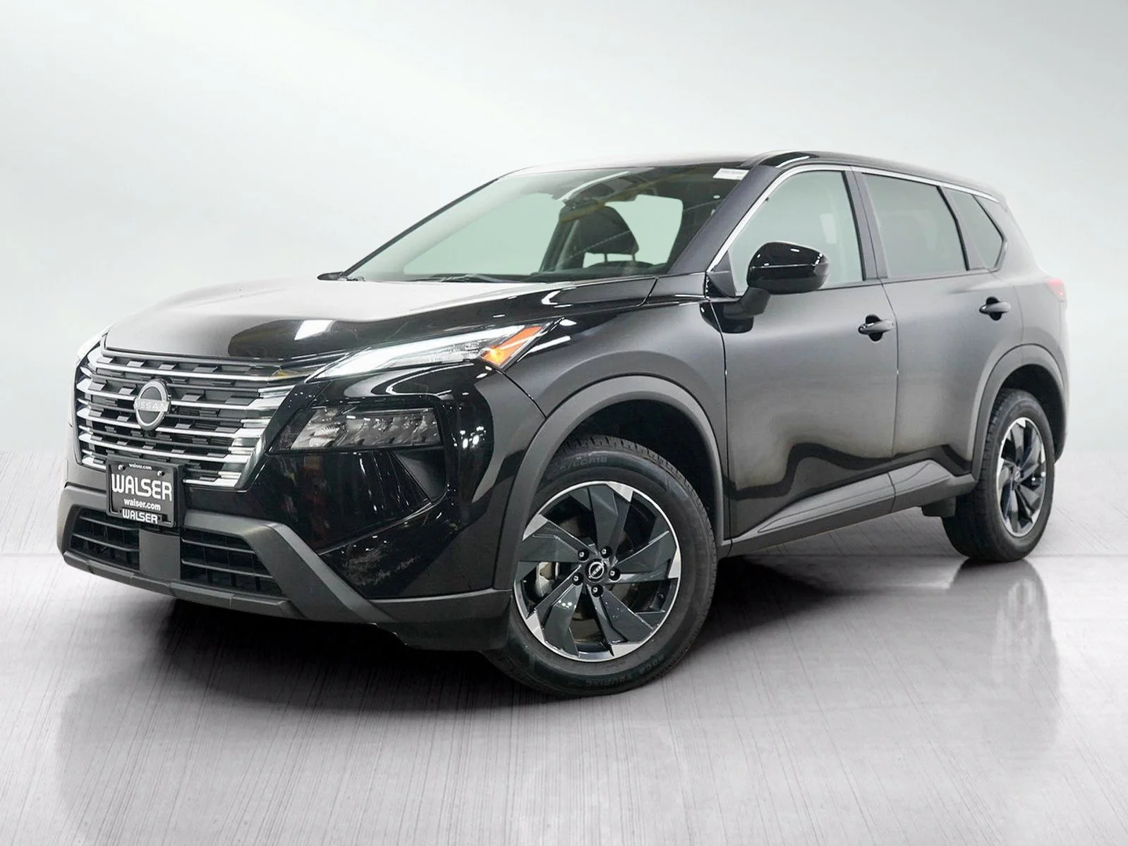 Used 2024 Super Black Nissan SV image 1