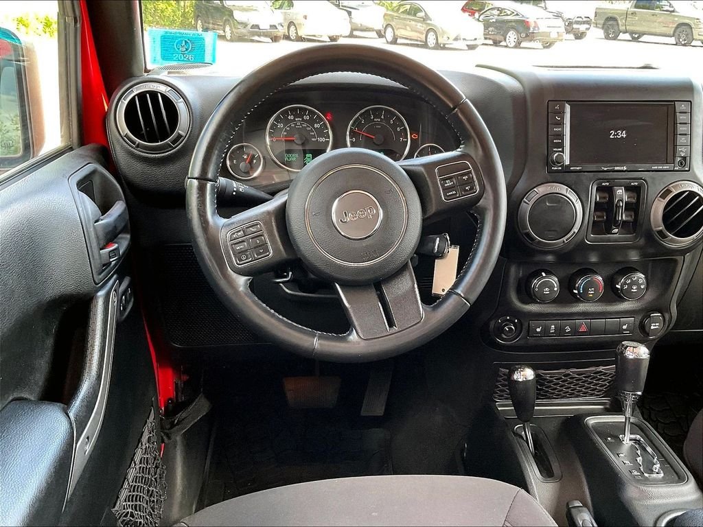 Used 2017 Red Jeep Unlimited Sport image 16