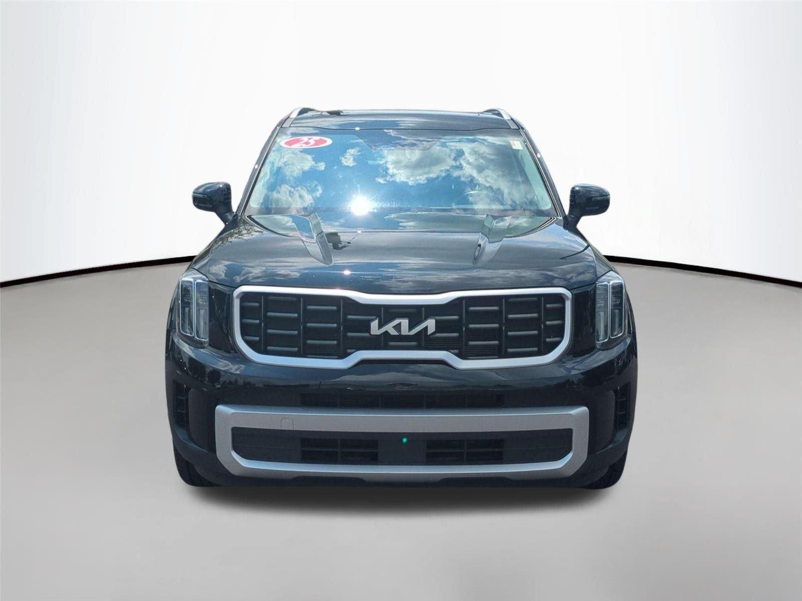 Used 2025 Ebony Black Kia S image 22