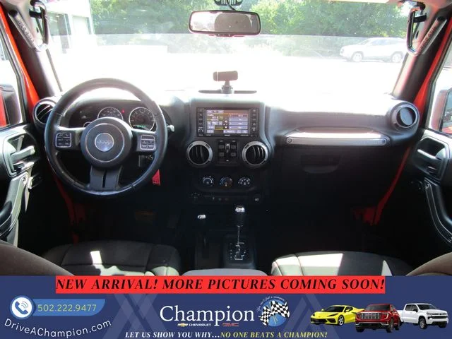 Used 2015 Orange Jeep Unlimited Sport image 10