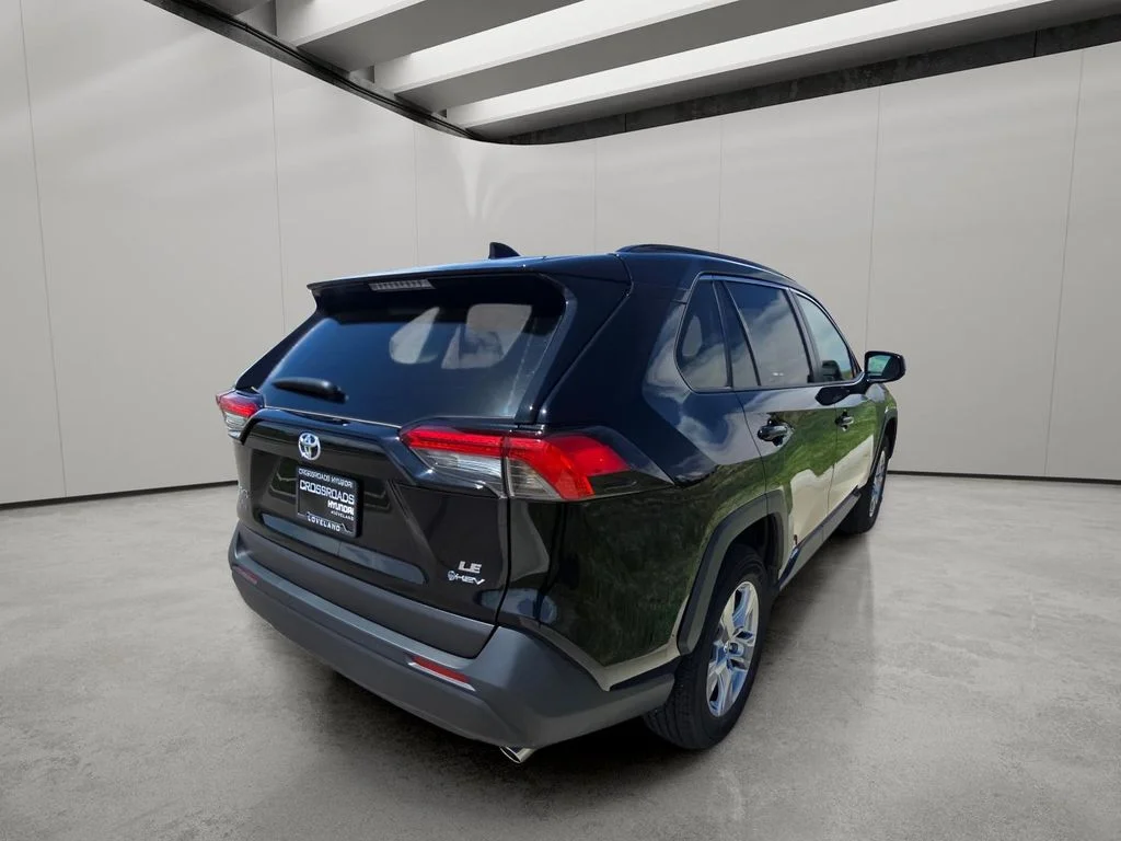 Used 2025 Midnight Black Metallic Toyota Hybrid LE image 5
