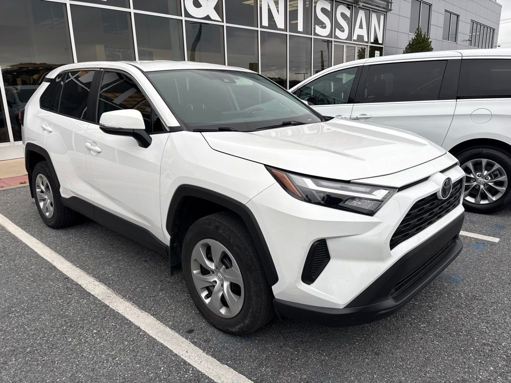 Used 2023 White Toyota LE image 1