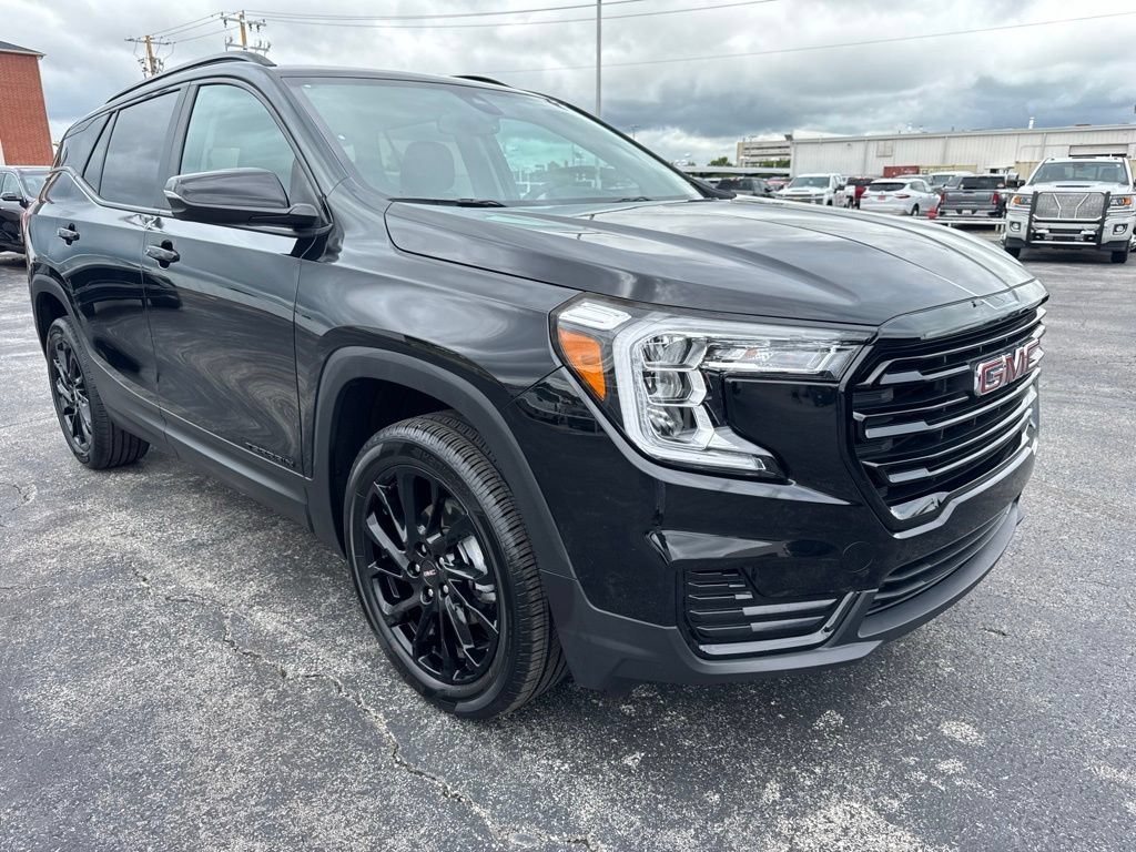 Used 2024 Ebony Twilight Metallic GMC SLE image 4