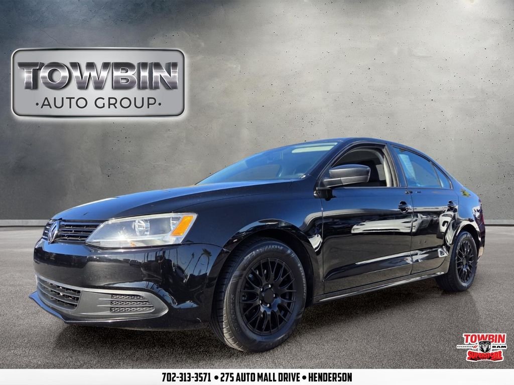 Used 2013 Black Volkswagen 2.0L S image 1