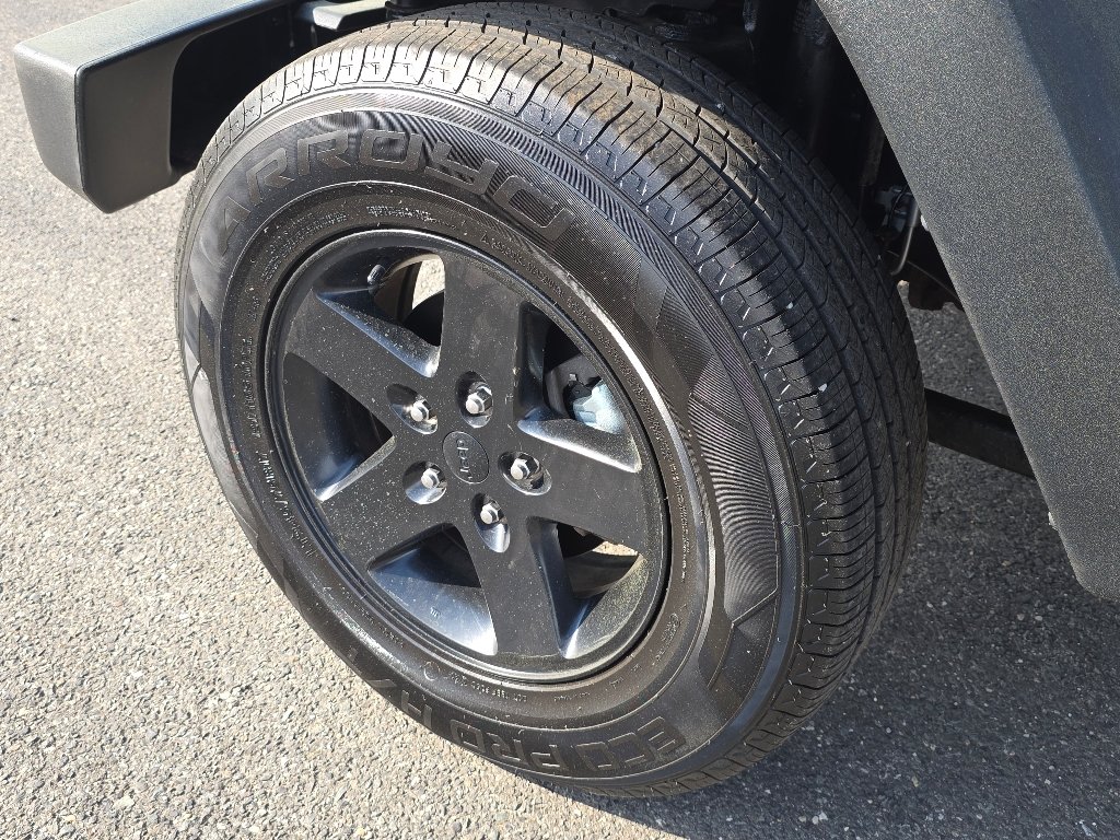 Used 2016 Granite Crystal Metallic Clear Coat Jeep Sport image 6