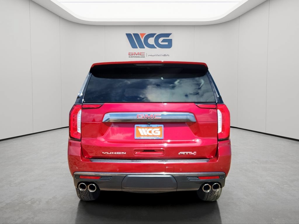 Used 2023 VOLCANIC RED TINTCOAT GMC AT4 image 4