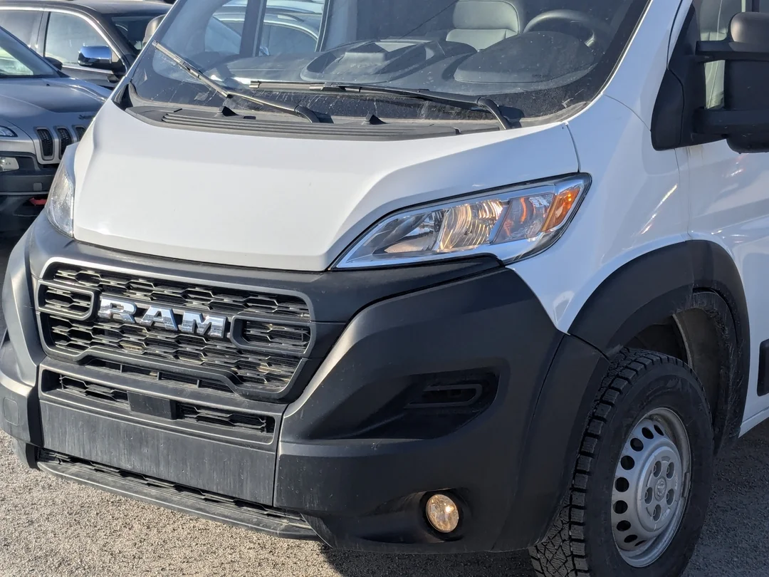 Certified Used 2025 White RAM Tradesman - - C/V HR 136 WB - Pkg 22B - Convenience Grp - Mopar Cargo Mat - Wall Paneling & More! image 9