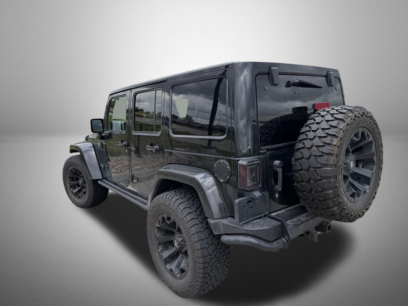 Used 2017 Black Jeep Unlimited Sahara image 3