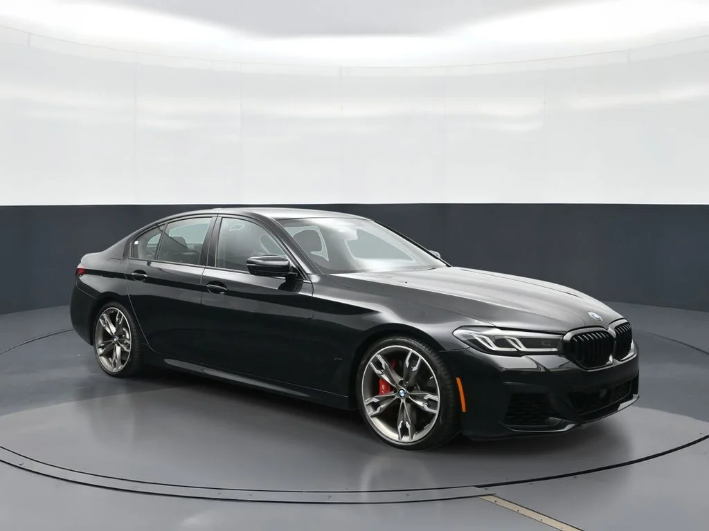 Certified Used 2023 Black Sapphire Metallic BMW M550i xDrive image 12