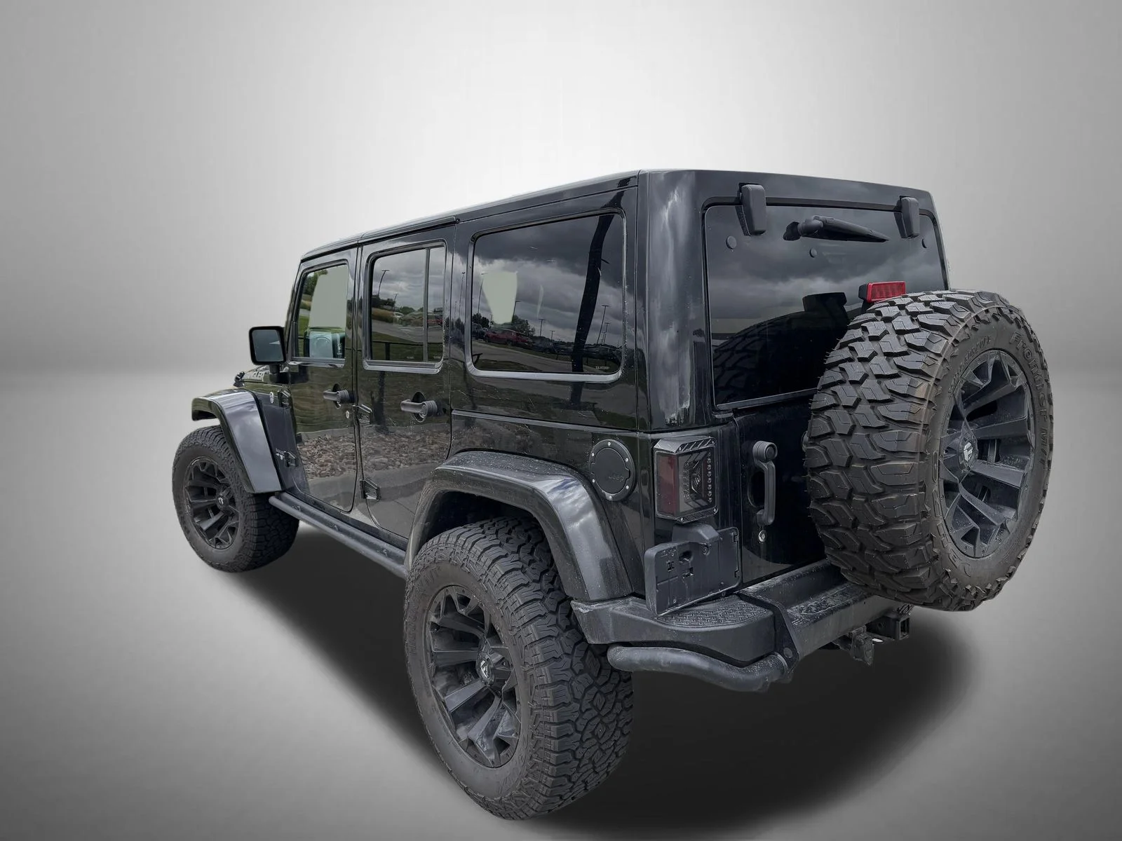 Used 2017 Black Jeep Unlimited Sahara image 3