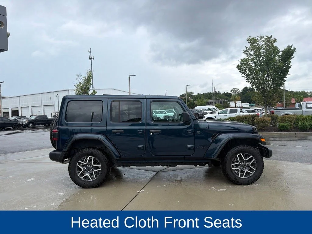 Used 2025 Fathom Blue Pearlcoat Jeep Sahara image 2