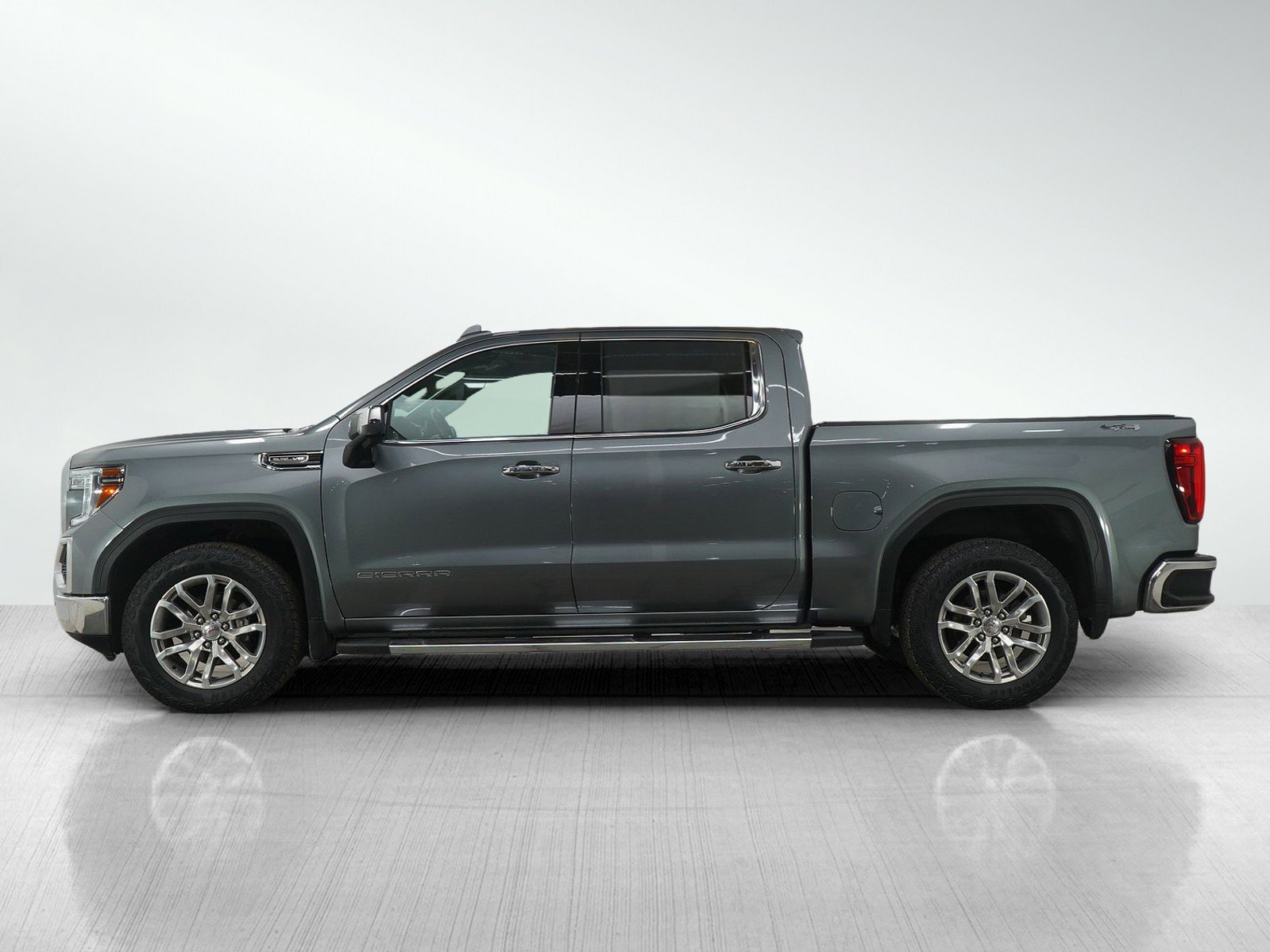 Used 2021 GMC Sierra 1500 SLT with VIN 3GTU9DEDXMG144795 for sale in Bloomington, Minnesota