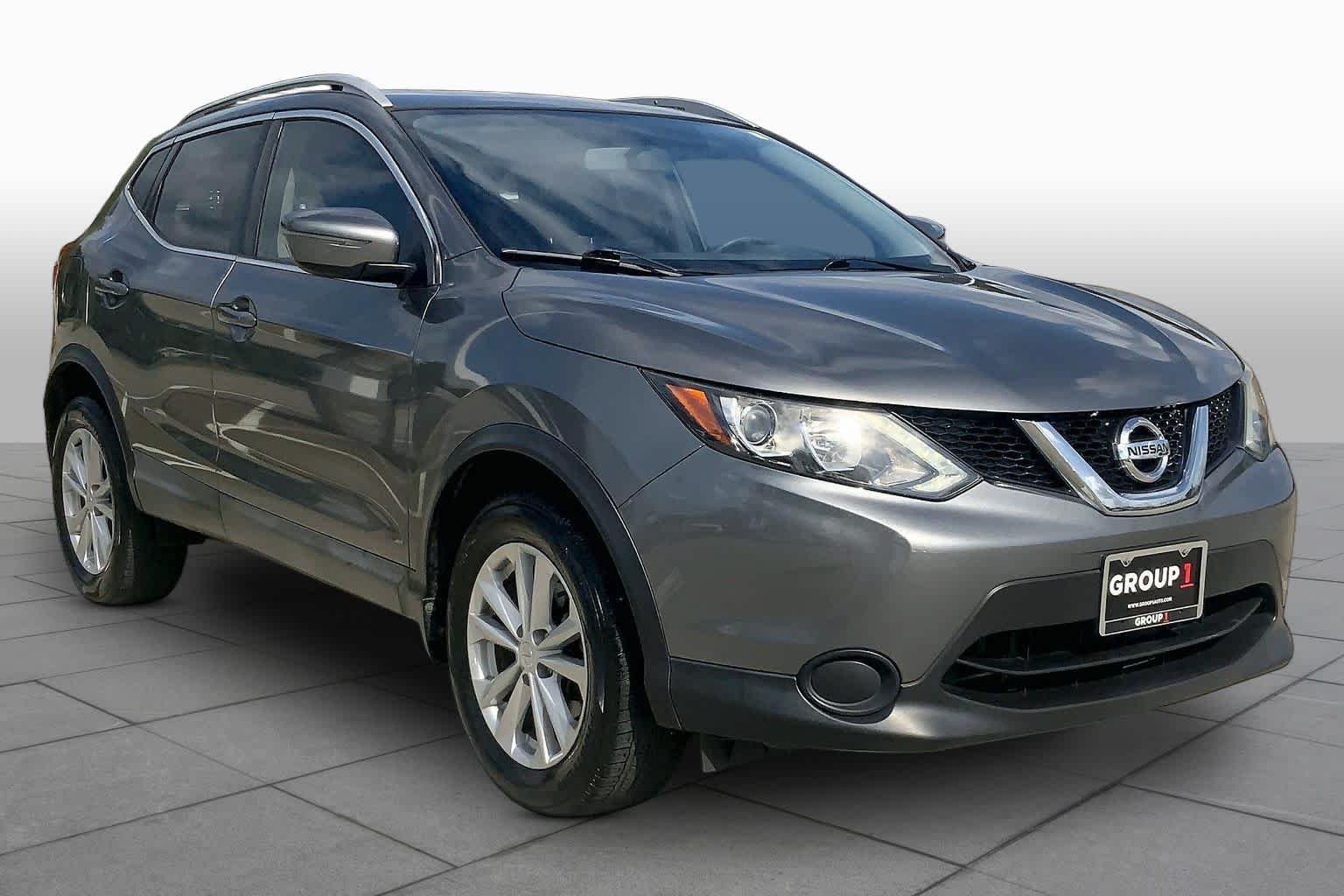 Used 2017 Gun Metallic Nissan SV image 3