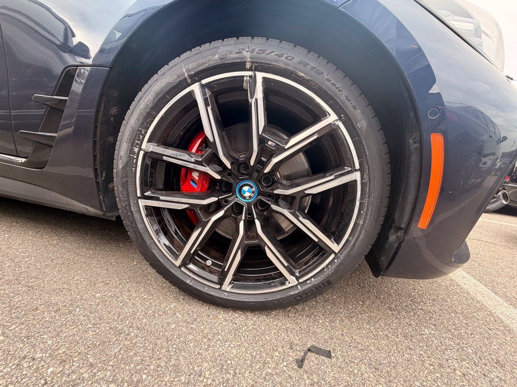 Used 2024 Tanzanite Blue II Metallic BMW eDrive35 image 6