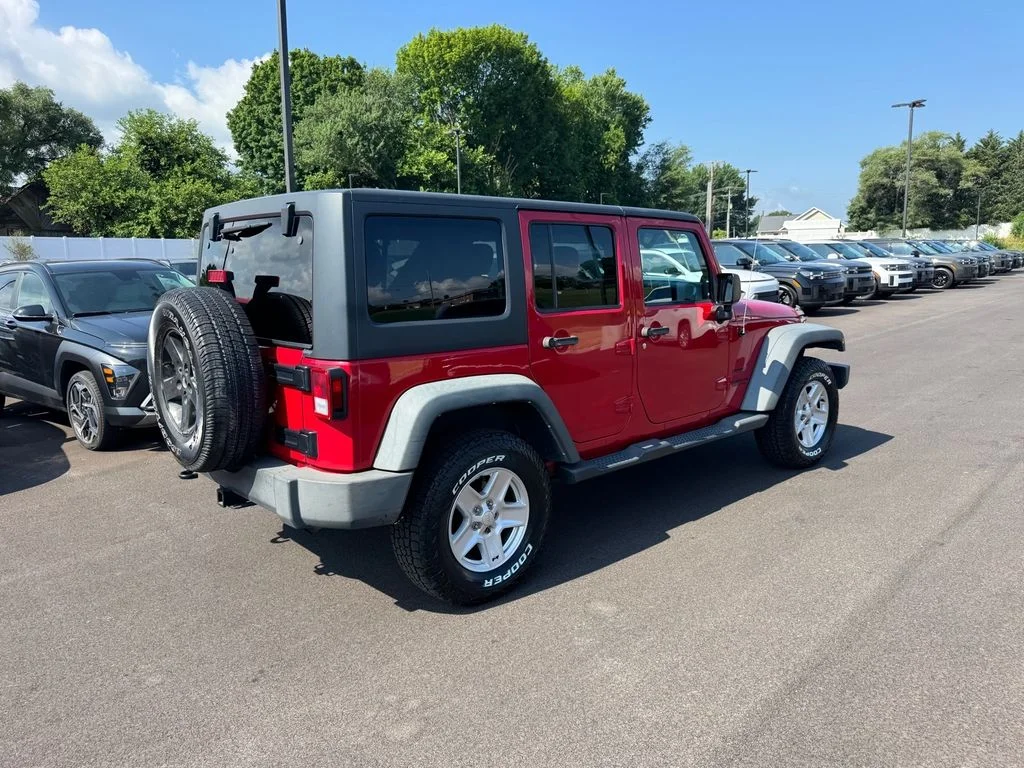 Used 2014 Red Jeep Unlimited Sport image 3