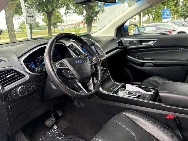 Used 2020 Blue Metallic Ford Titanium image 24