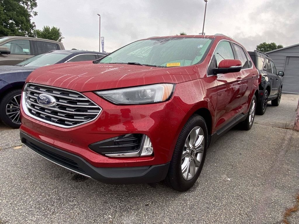 Certified Used 2023 Rapid Red Metallic Tinted Clearcoat Ford Titanium image 3