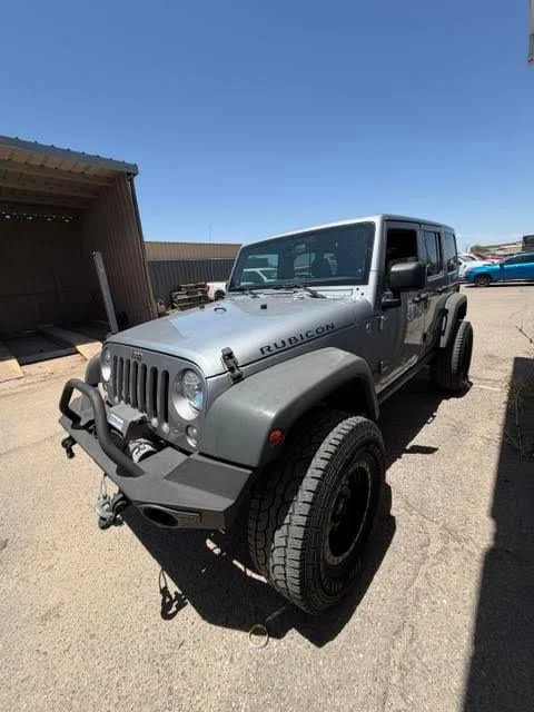 Used 2014 Gray Jeep Unlimited Rubicon image 1