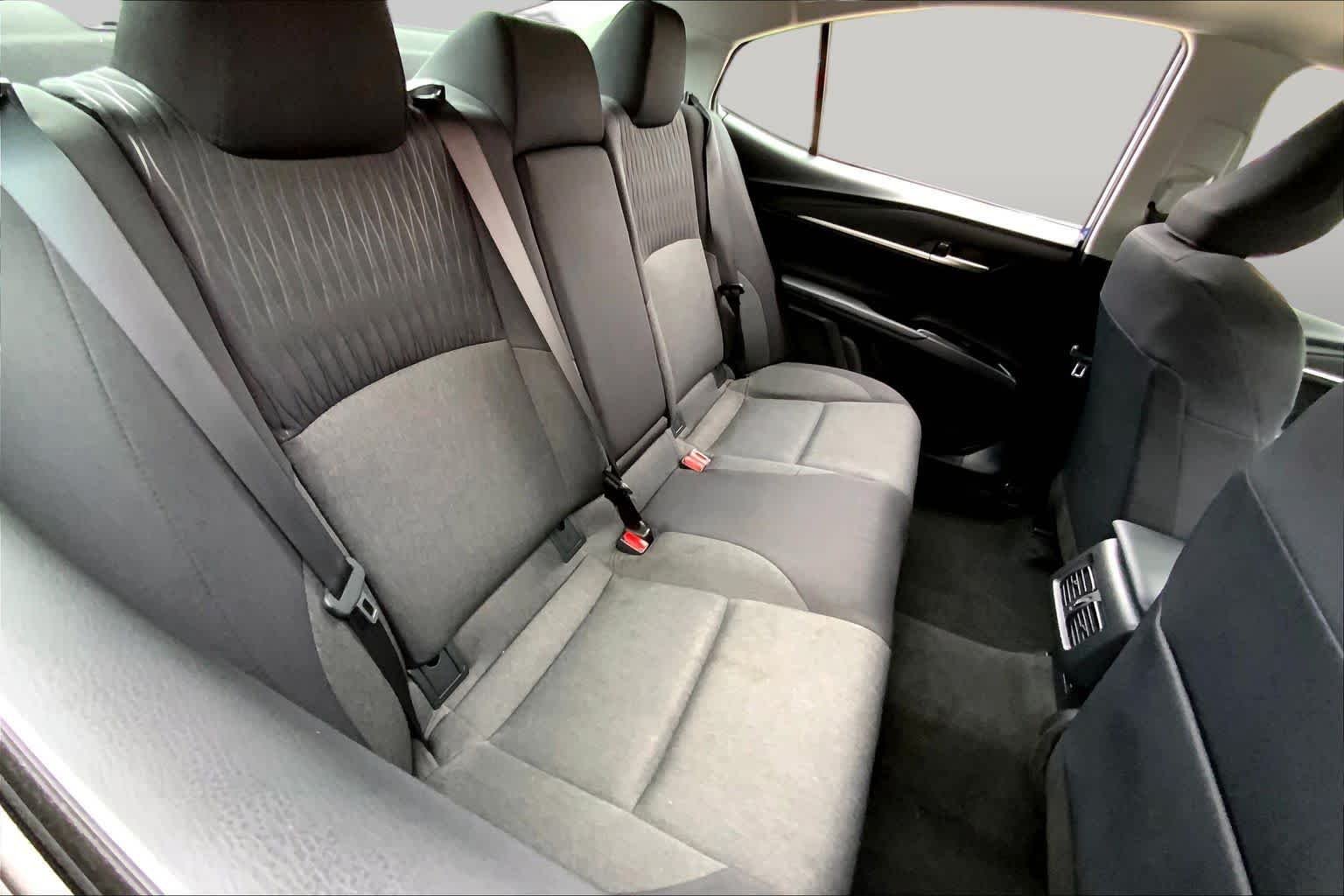 Used 2025 Reservoir Blue Toyota LE image 19