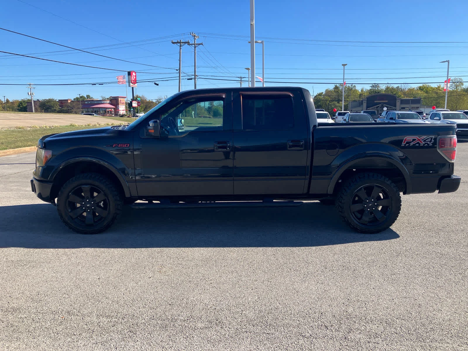 Used 2012 Tuxedo Black Metallic Ford FX4 image 4