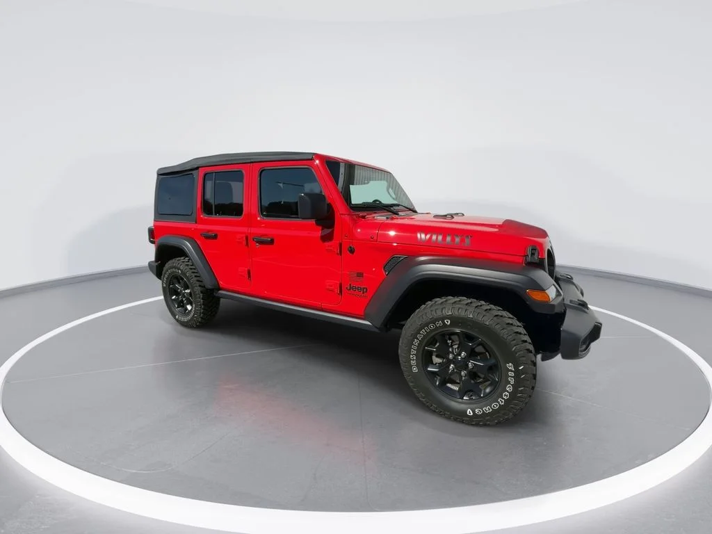 Used 2021 Red Jeep Unlimited Willys image 2