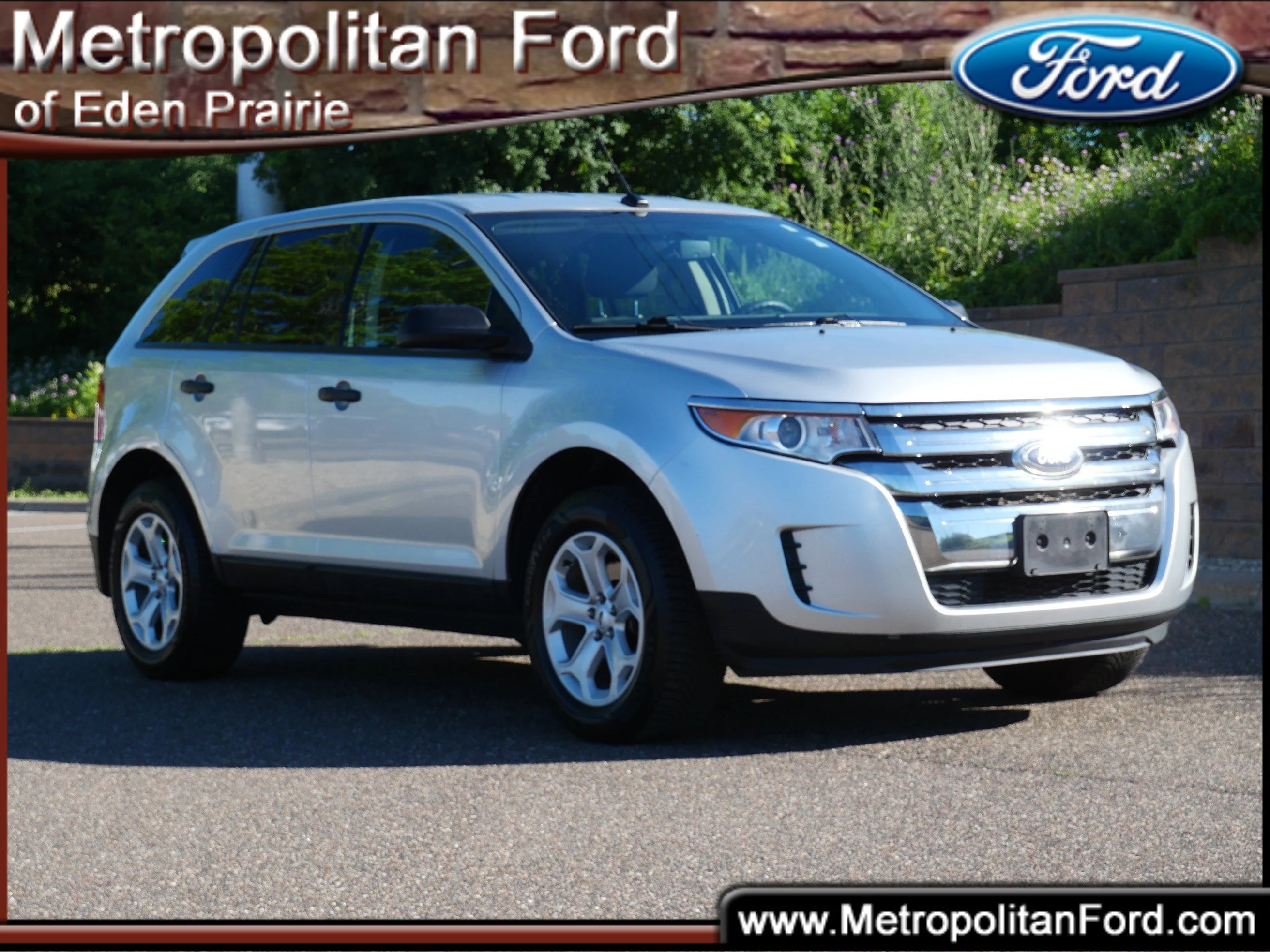 Used 2014 Ingot Silver Metallic Ford SE image 1