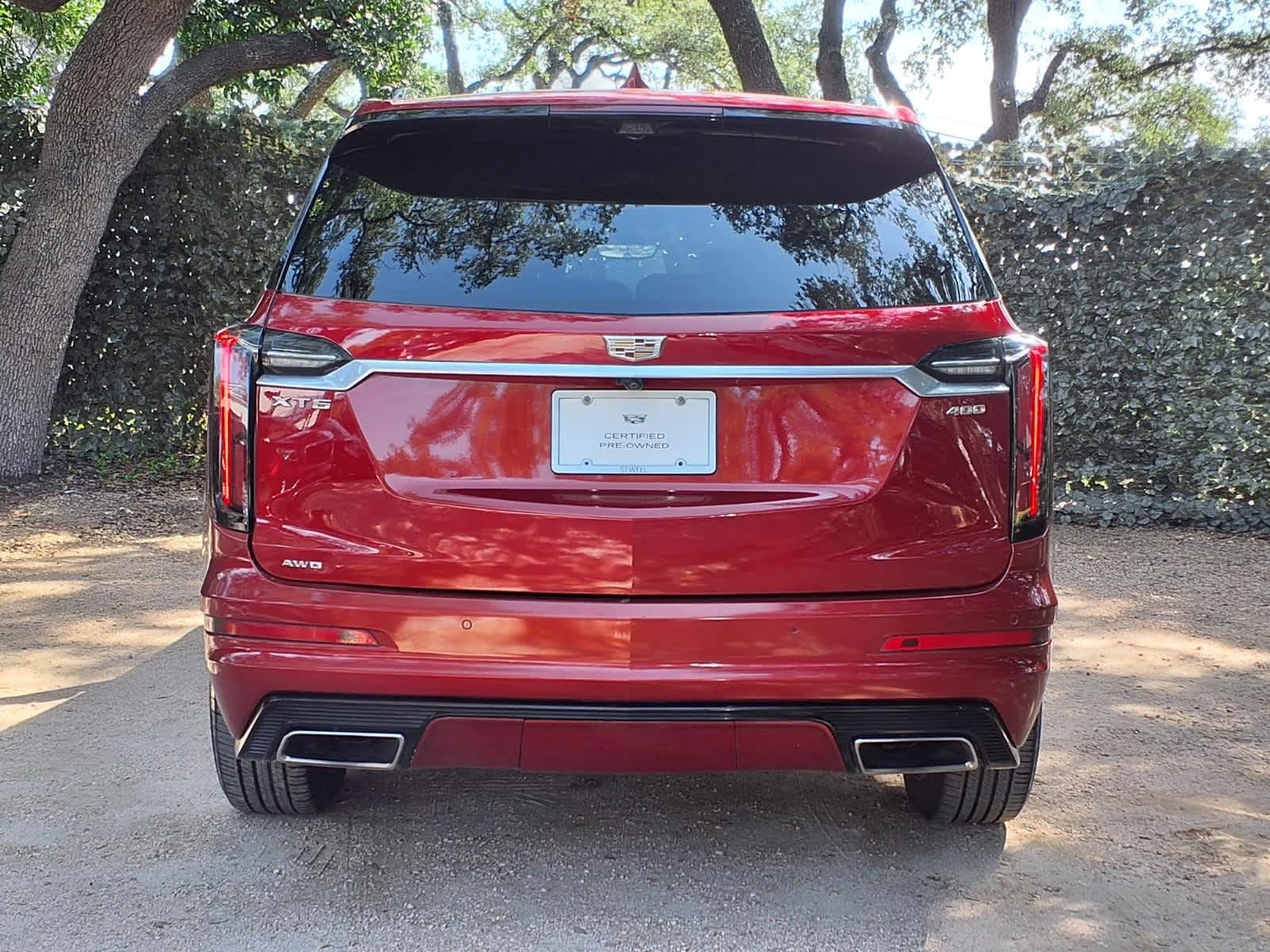 Used 2024 Radiant Red Tintcoat Cadillac Sport image 7