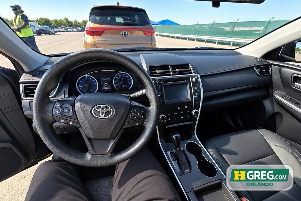 Used 2016 Midnight Black Metallic Toyota LE image 11
