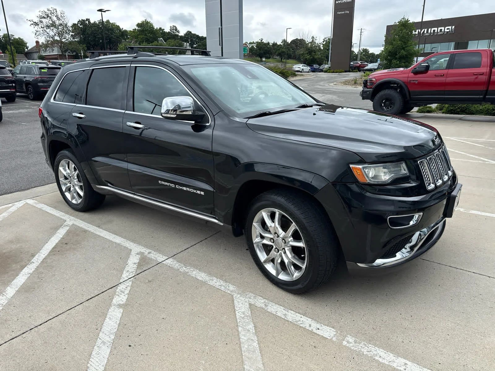 Used 2014 Brilliant Black Crystal Pearlcoat Jeep Summit image 3