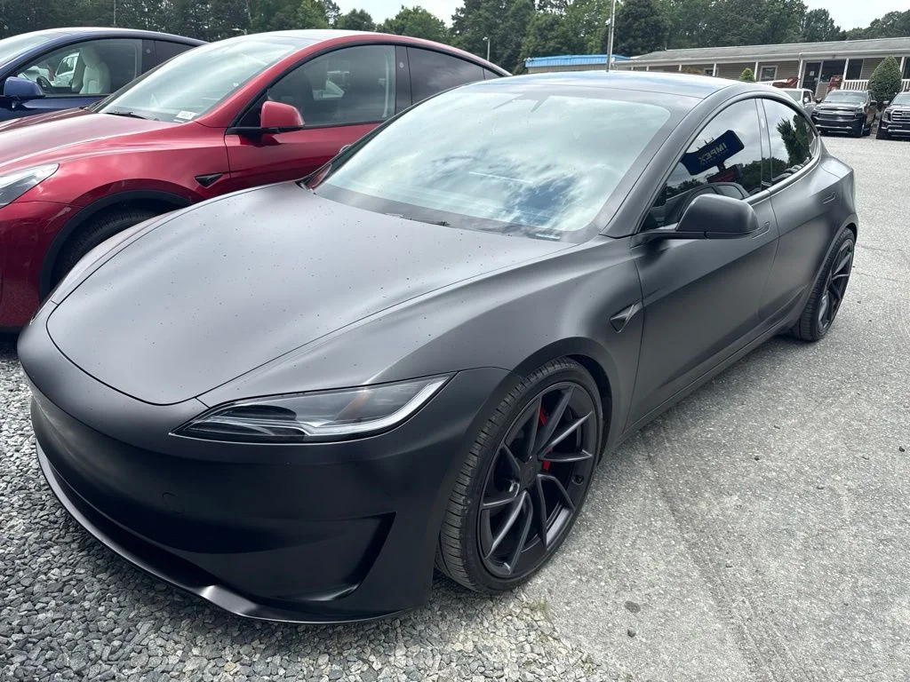 Used 2025 Black Tesla Performance image 1