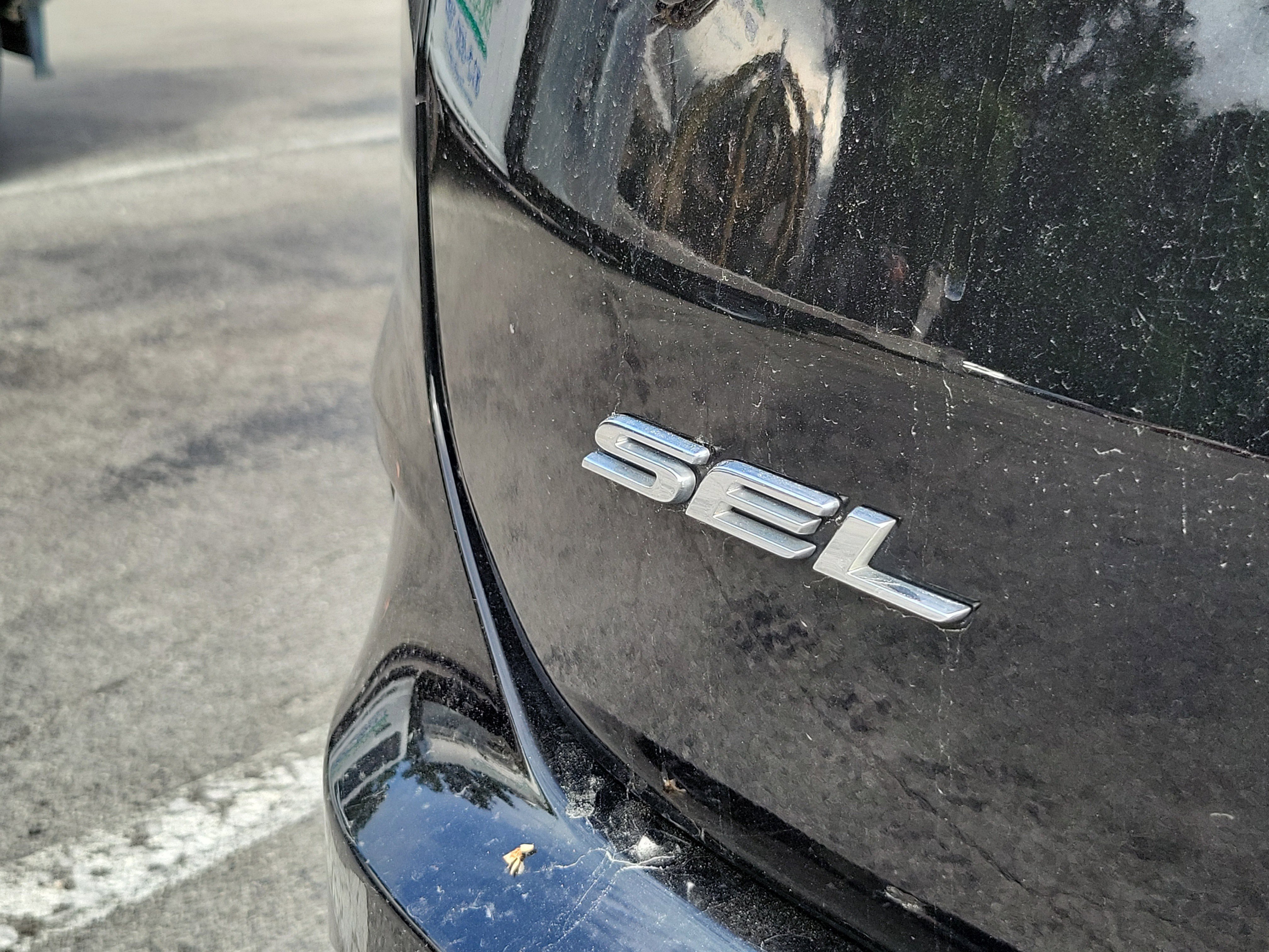 Used 2024 Agate Black Metallic Ford SEL image 3