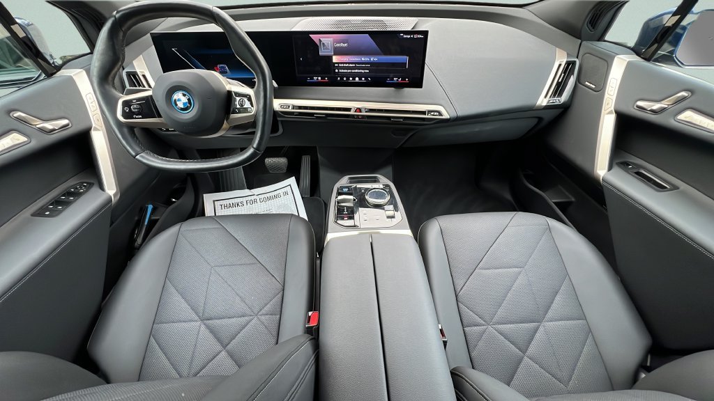 Certified Used 2024 Blue BMW xDrive50 image 10